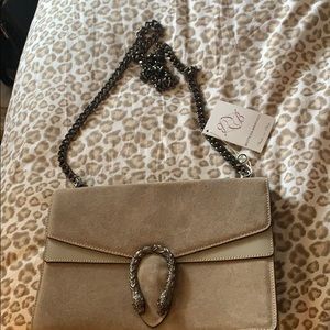 Grey evening bag with long chain strap